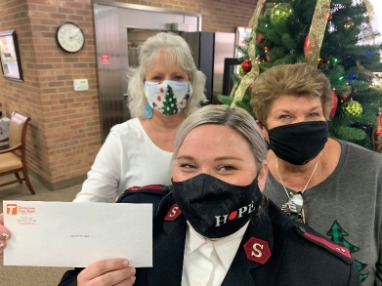 TSB Employee $1 Jeans donations were collected and this is a check for the Salvation Army.