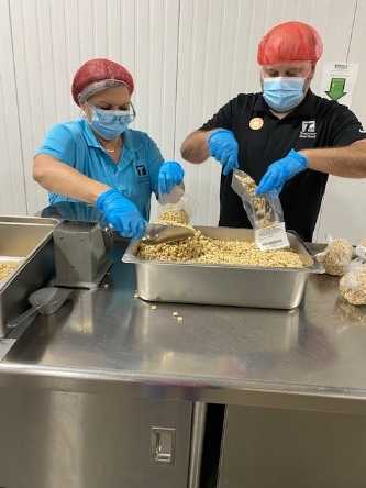 Melissa Ownby & Rex Rauhuff helping at Second Harvest