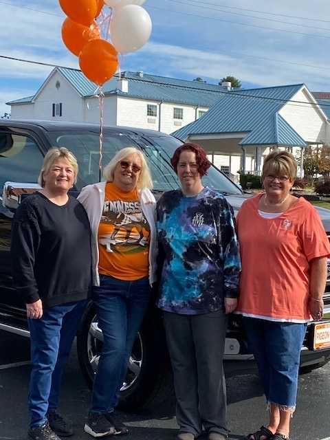 Winner of the 50th Anniversary Truck, Debbie Smith, pictured with friends and Tammie Sutton, EVP Operations.