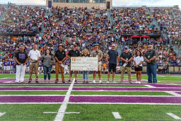 Presentation of the Jamboree Check at SCHS for the sell of TSB School Spirit Cards.